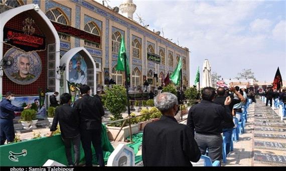 آیین عزاداری تاسوعای حسینی در جوار مرقد شهید سلیمانی به روایت تصویر